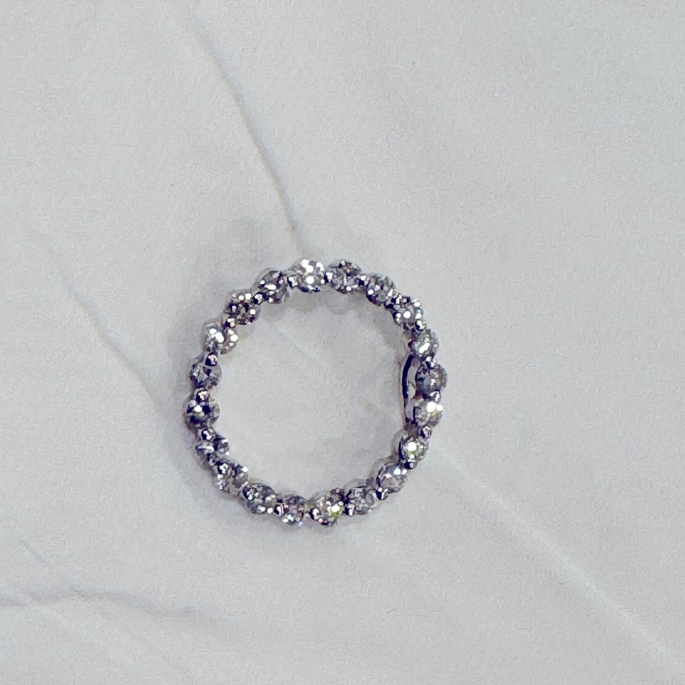 Diamond circle pendant set in 18kt gold. Like new.